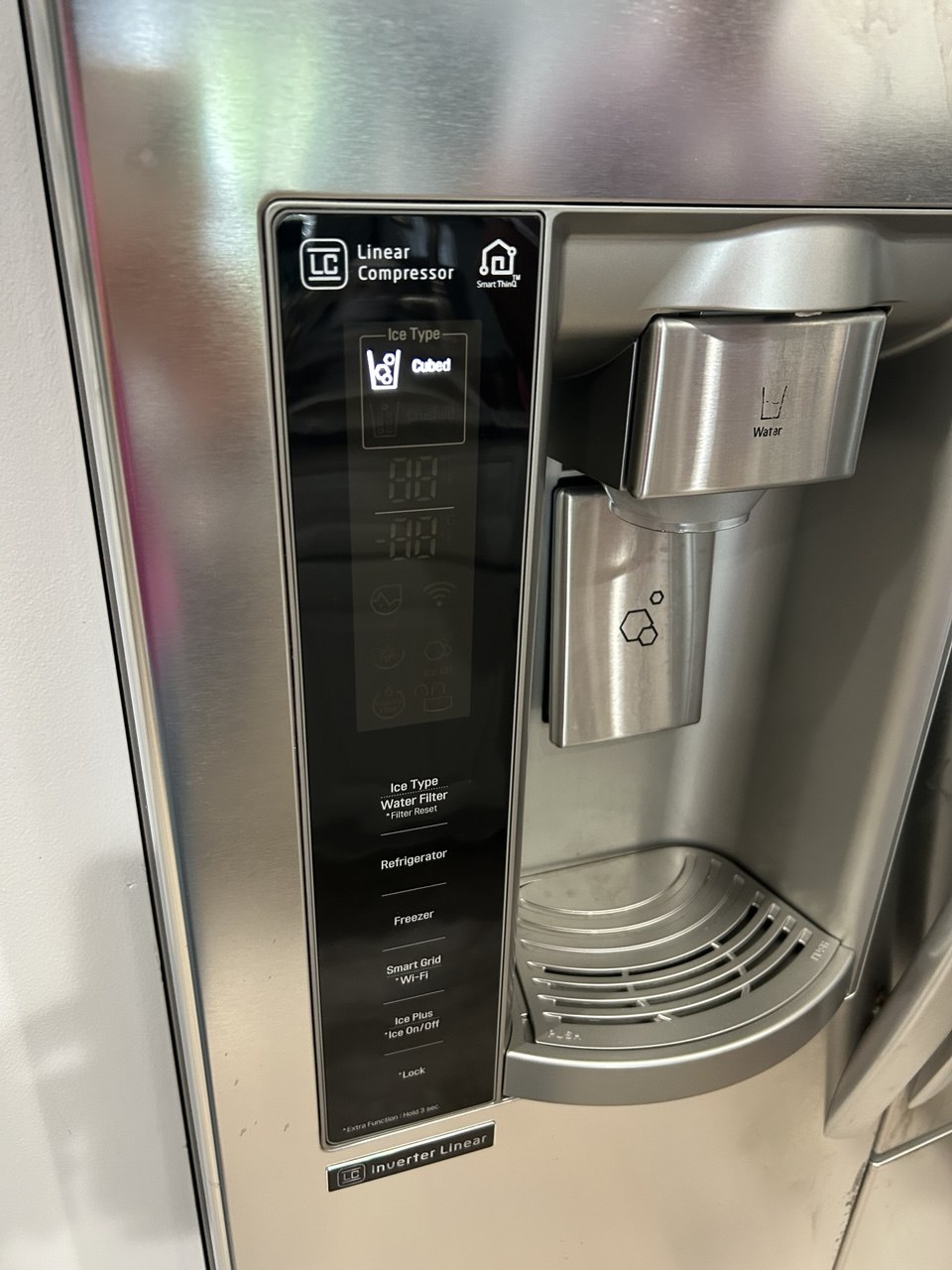 Refrigerator repair in progress in a Naples home